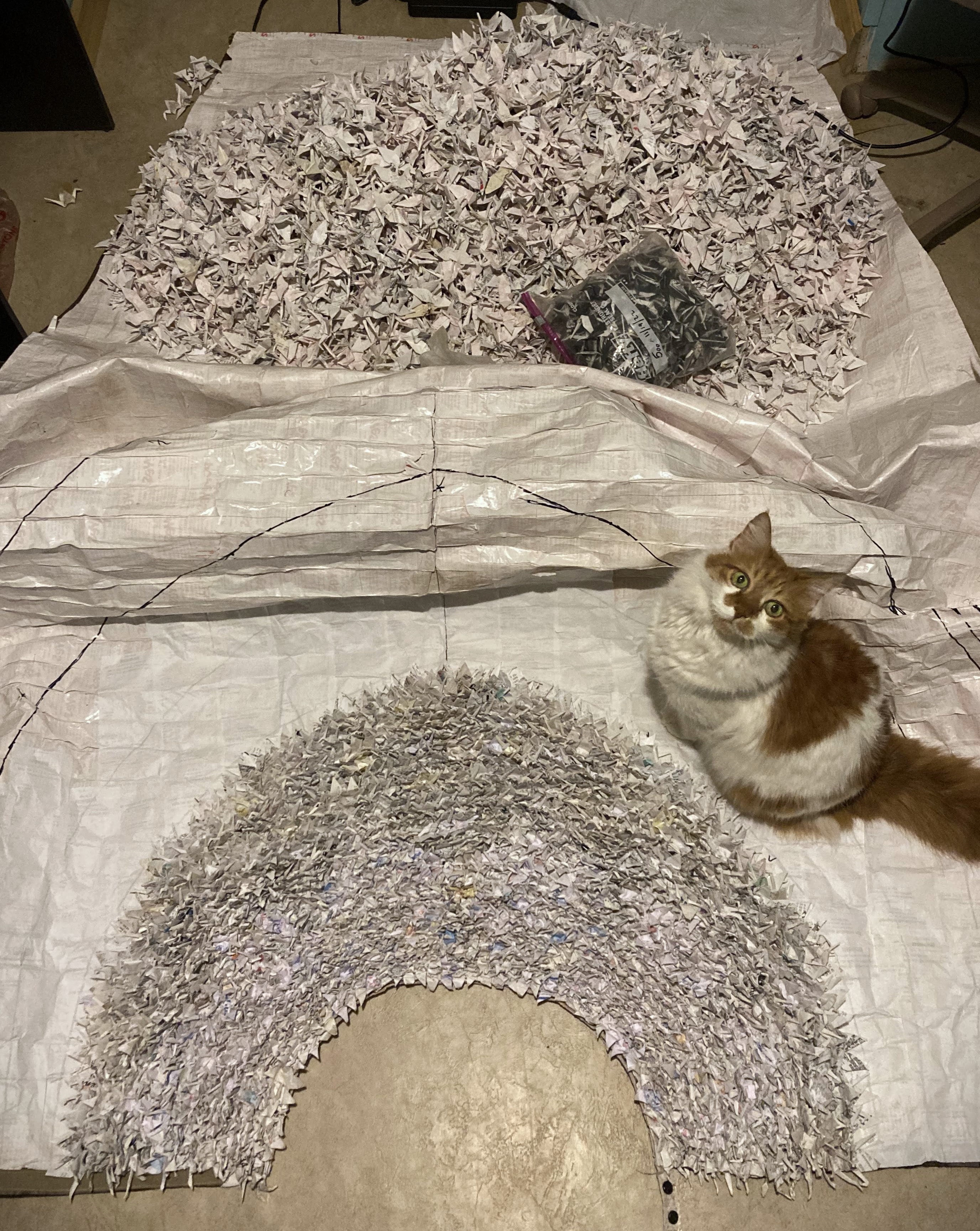 Sewing cranes onto garment